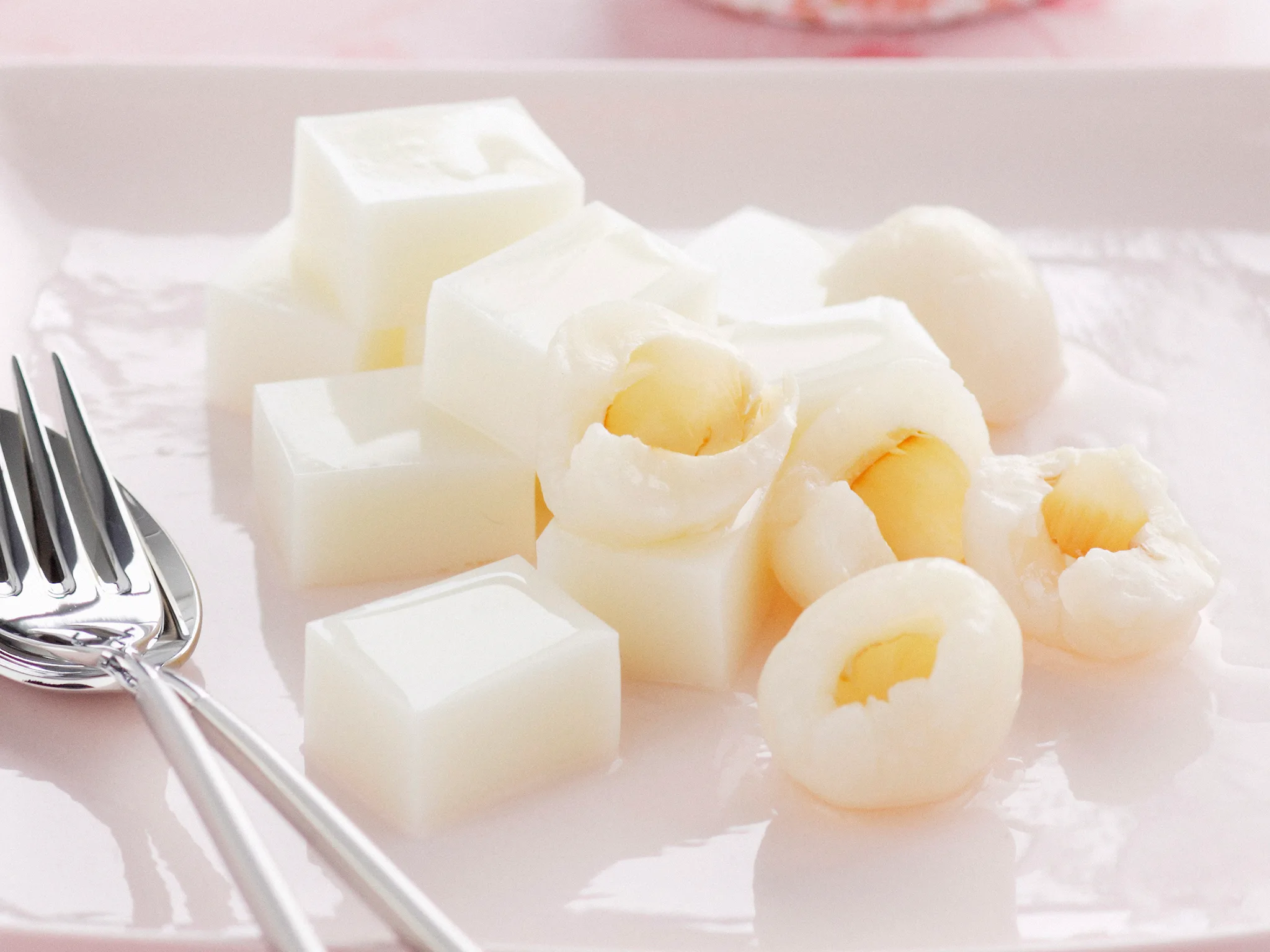 Almond jelly with lychees