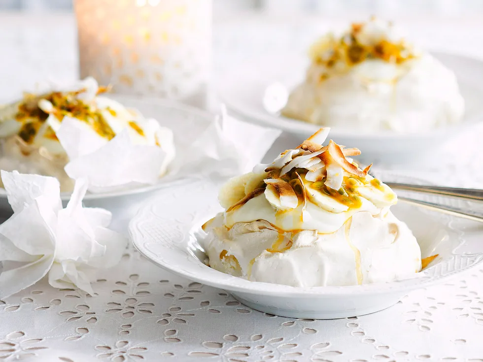 Coconut pavlovas with banana and passionfruit