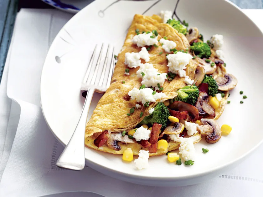 Bacon, corn, chive and ricotta omelettes
