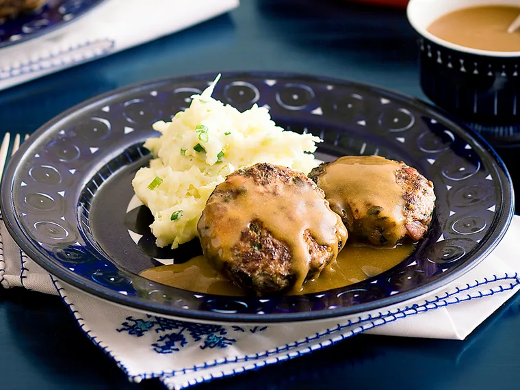 beef and bacon rissoles with gravy and cabbage mash