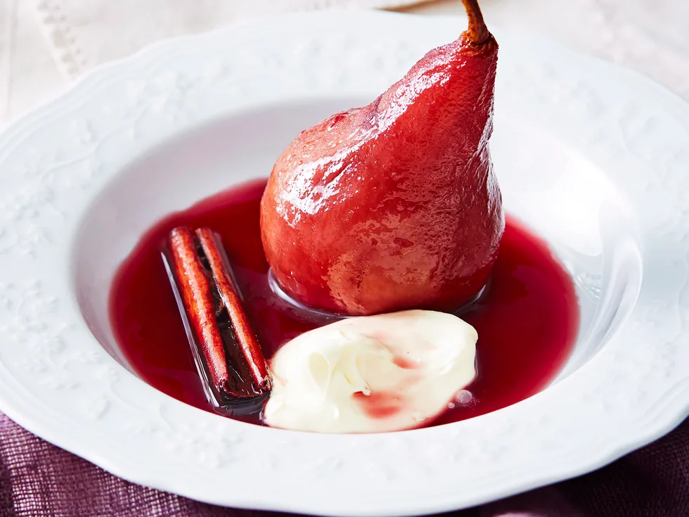 Poached pears in red wine sauce