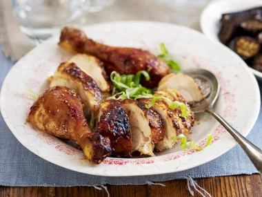 Sticky sesame chicken with sweet and sour glazed eggplant