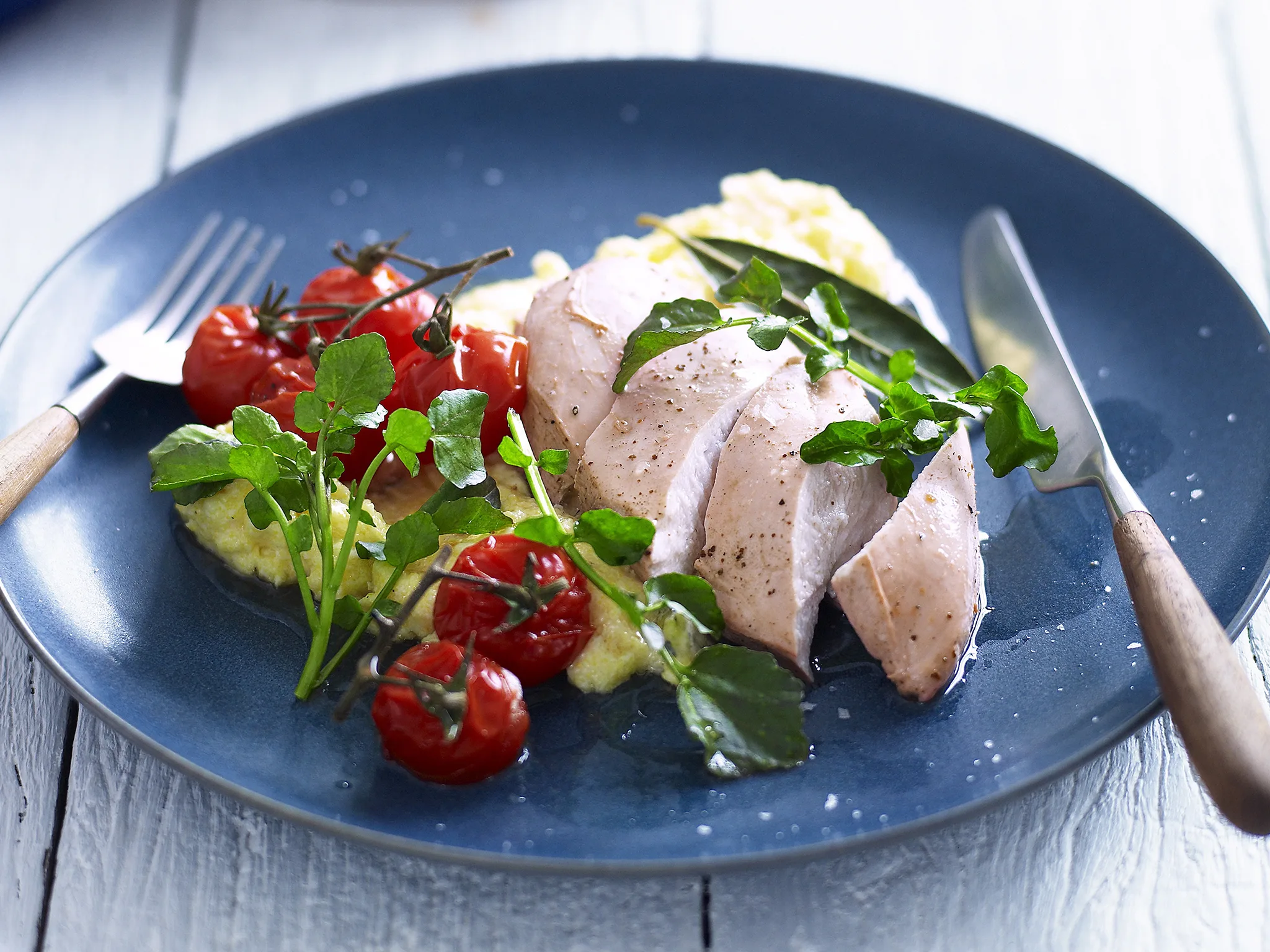 sumac chicken with cheese polenta and tomatoes