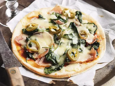 Ham, spinach and jalapeno pizzas