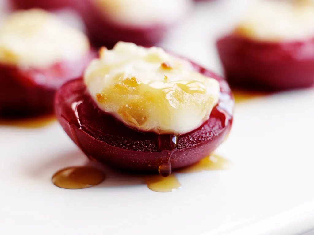 Roasted Plums with Goat's Cheese and Preserved Ginger