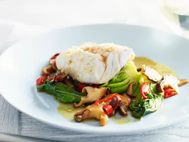 Steamed fish with bok choy and mushrooms