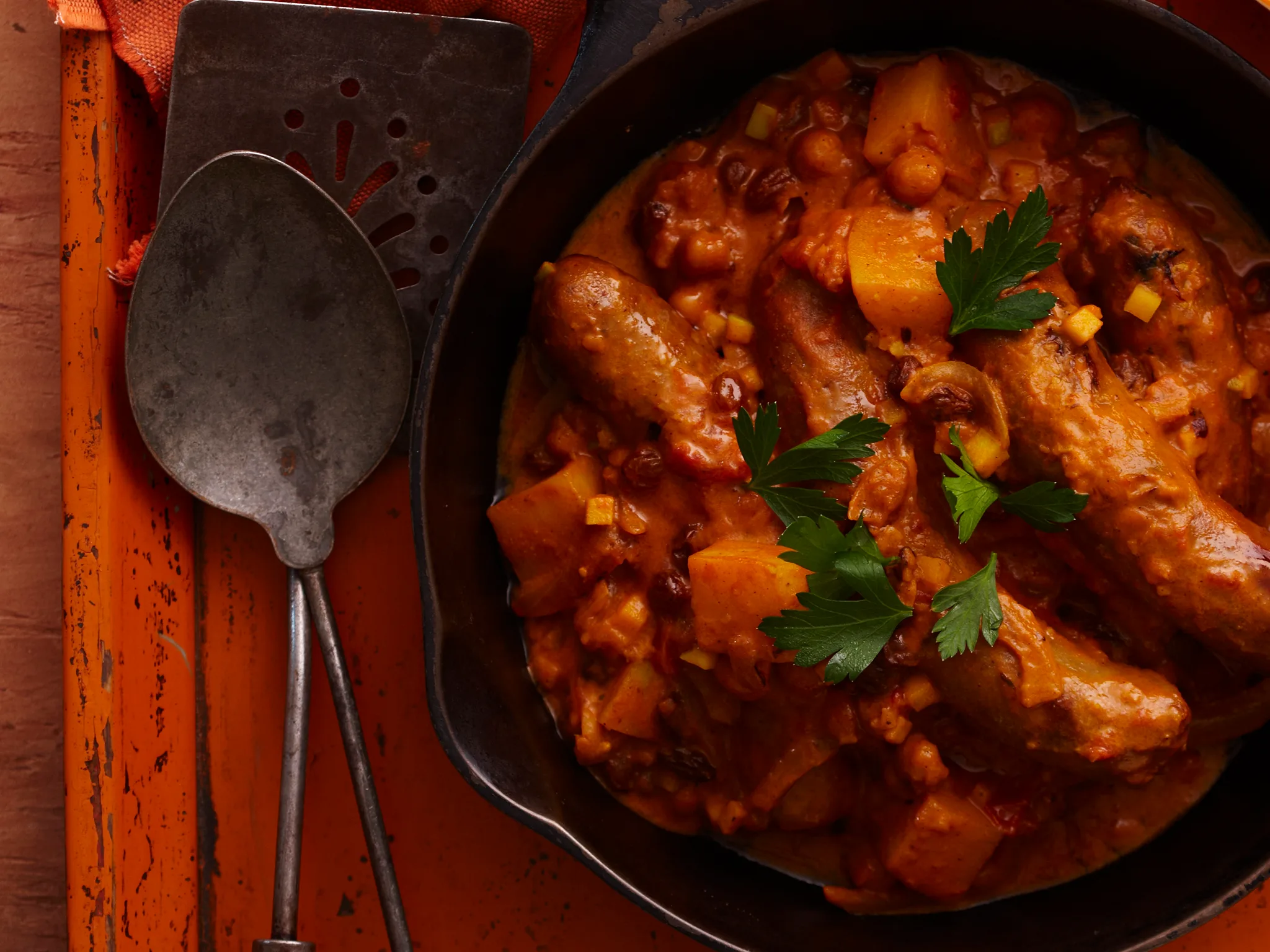 Sweet curried sausages