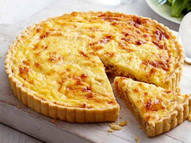 quiche lorraine with a slice cut