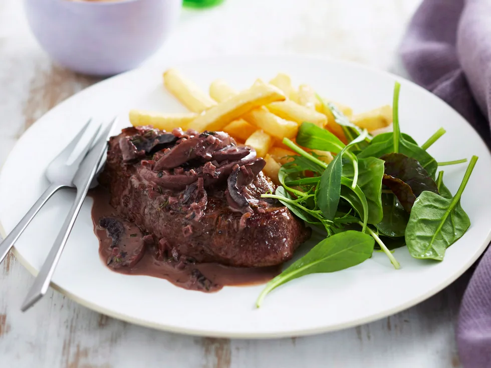 Steak with red wine and mushroom sauce