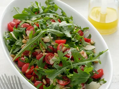 Tomato, rocket and pine nut salad