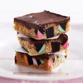 a stack of licorice allsorts slice pieces