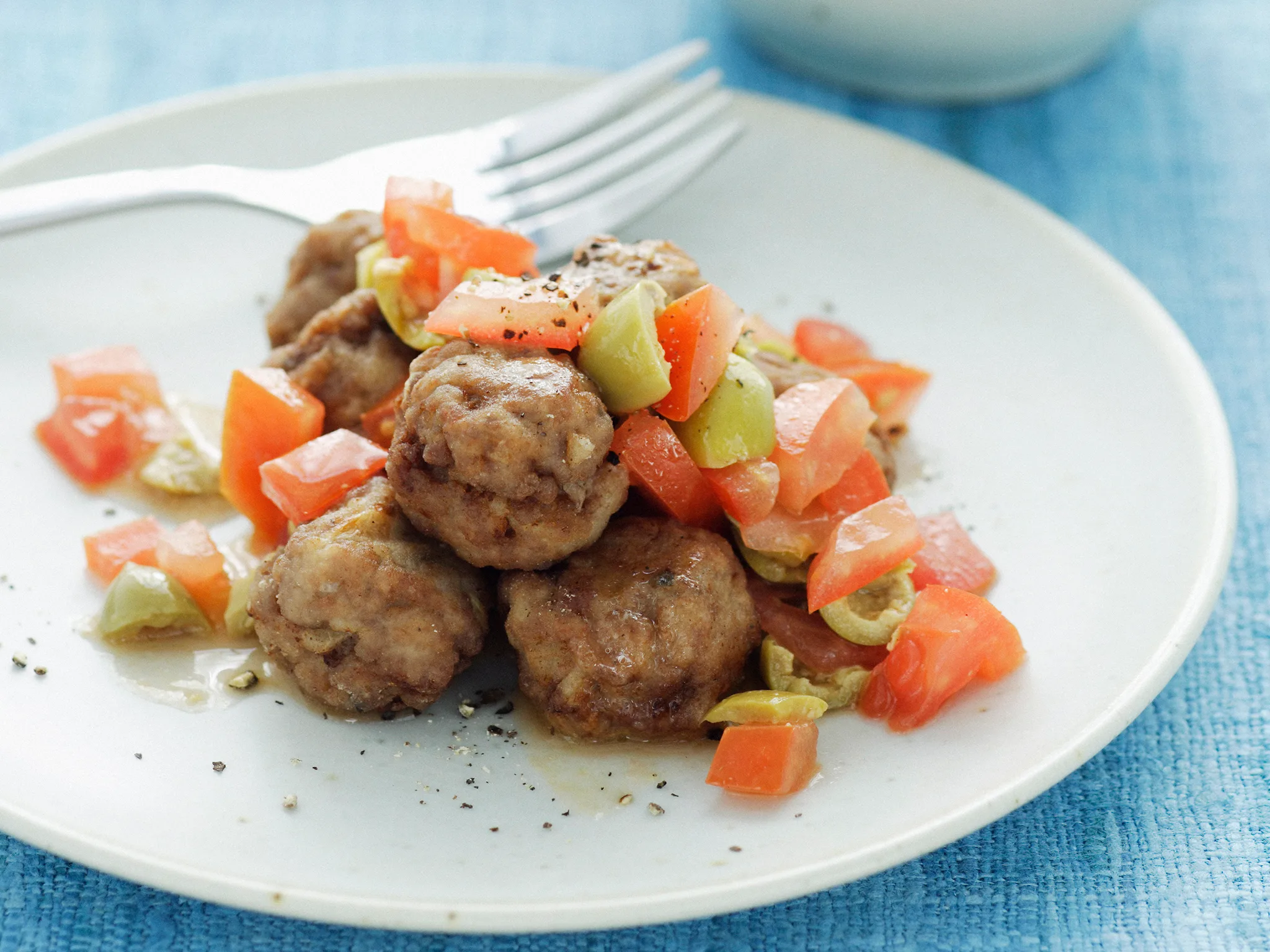MEATBALLS WITH TOMATO AND GREEN OLIVE SAUCE