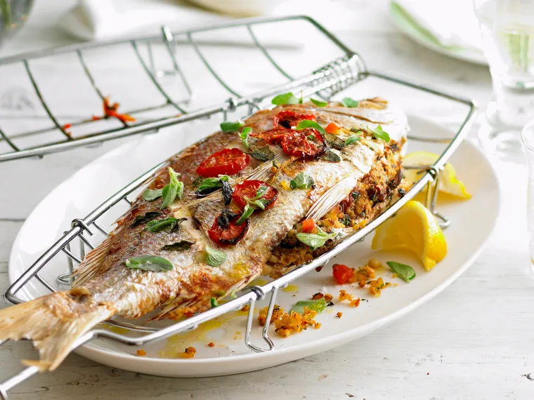 Barbecued whole snapper with pine nut stuffing