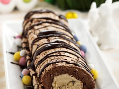Chocolate meringue roll with coffee and hazelnut cream