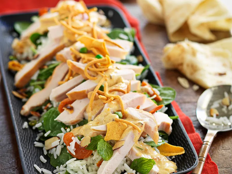 Smoked chicken rice salad with curried mango dressing