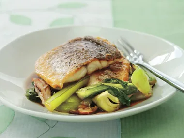 BARRAMUNDI WITH STIR-FRIED SHIITAKE MUSHROOMS AND ASIAN GREENS