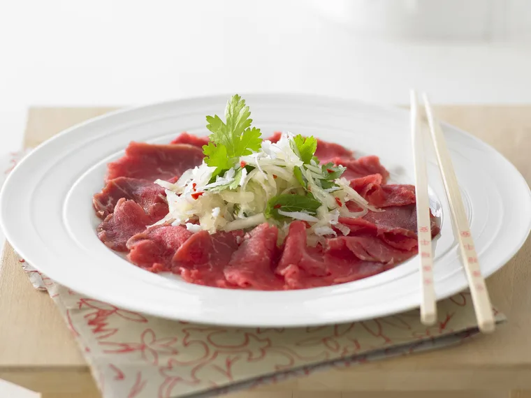 beef carpaccio with green papaya salad