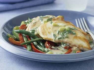 Chicken with creamy herb sauce, capsicums, beans and garlic