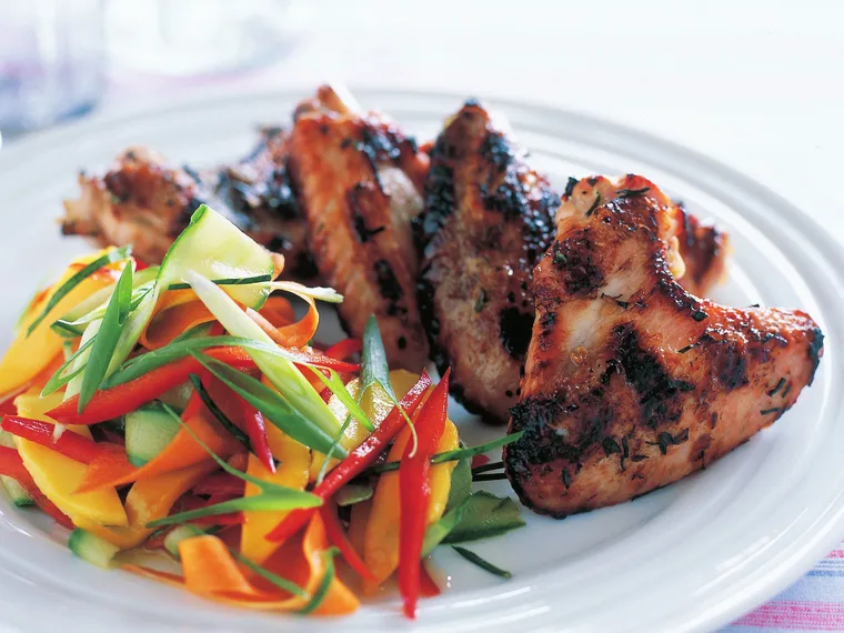 chicken wings and green mango salad