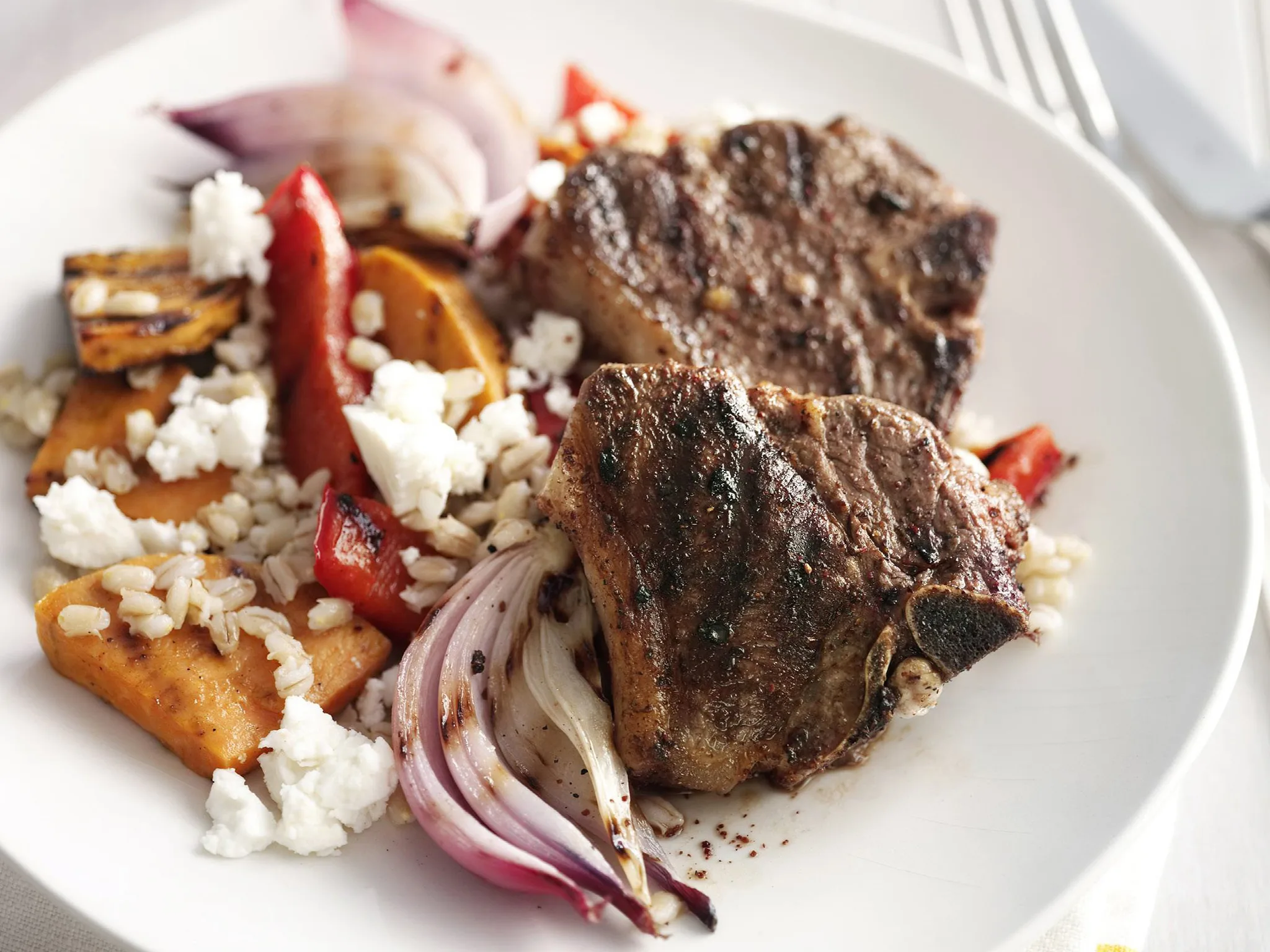 sumac lamb on pearl barley salad