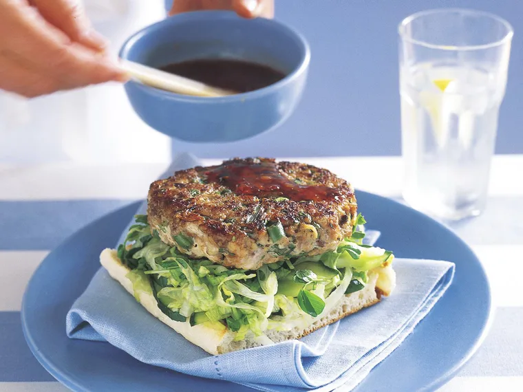 Thai fish burgers with sour and sweet green salad
