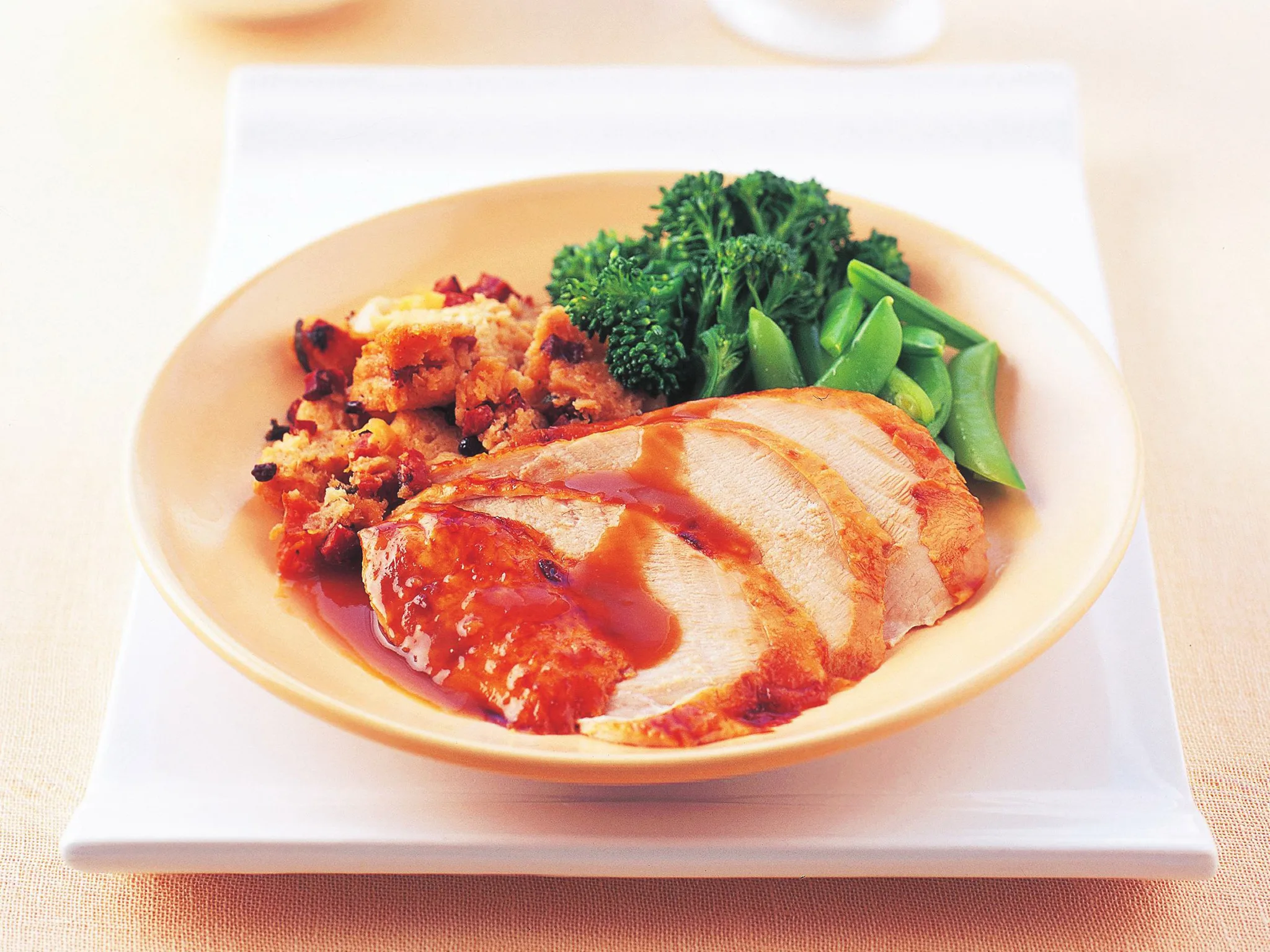 pomegranate-glazed turkey with cornbread seasoning