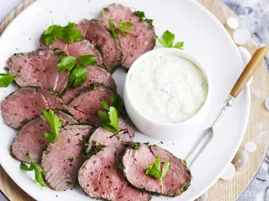 roast beef with fresh herbs and blue cheese sauce