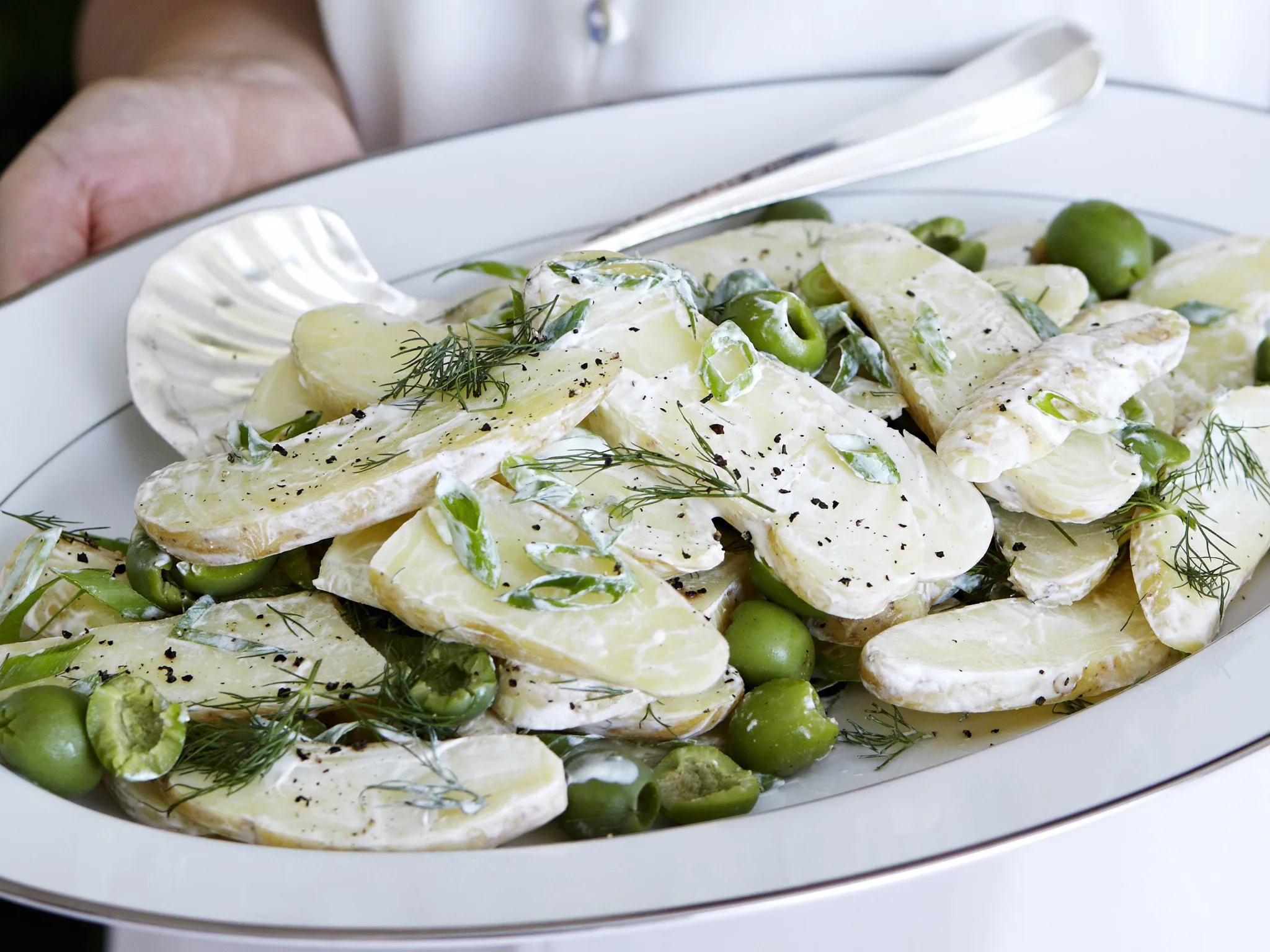 Potato salad with green olives and dill-image