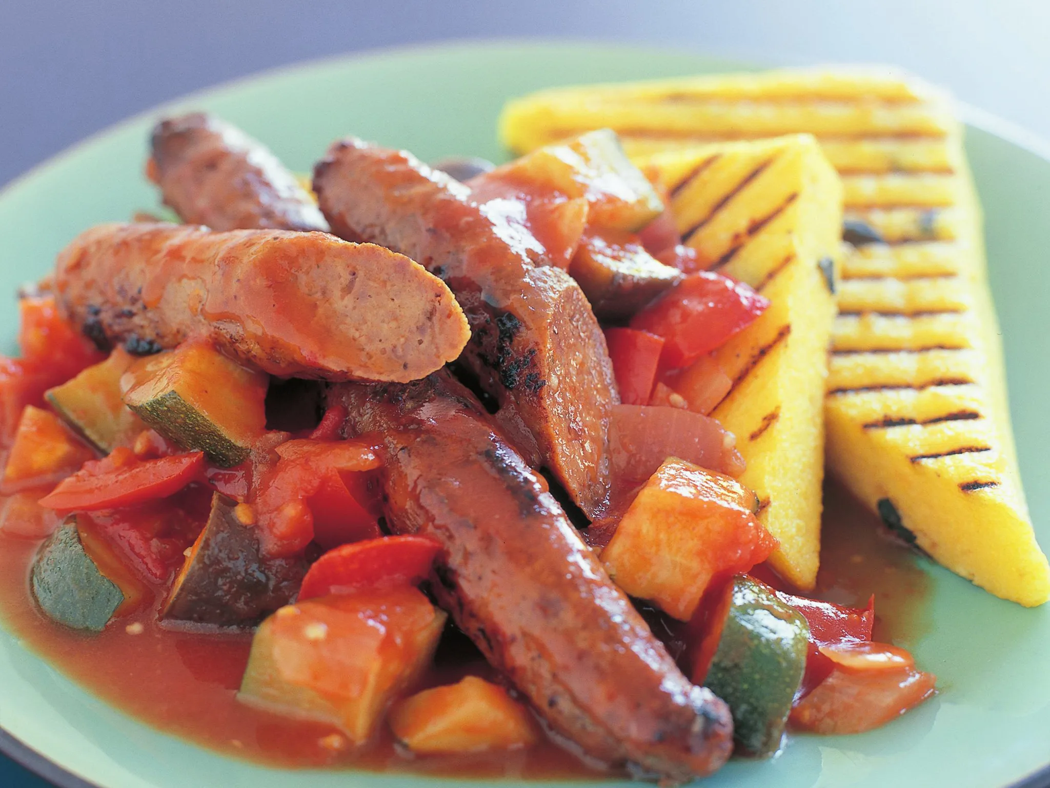 grilled sausages, ratatouille and polenta triangles