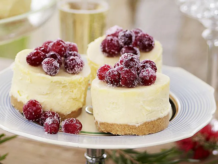 White Chocolate Cheesecakes with Frosted Cranberries