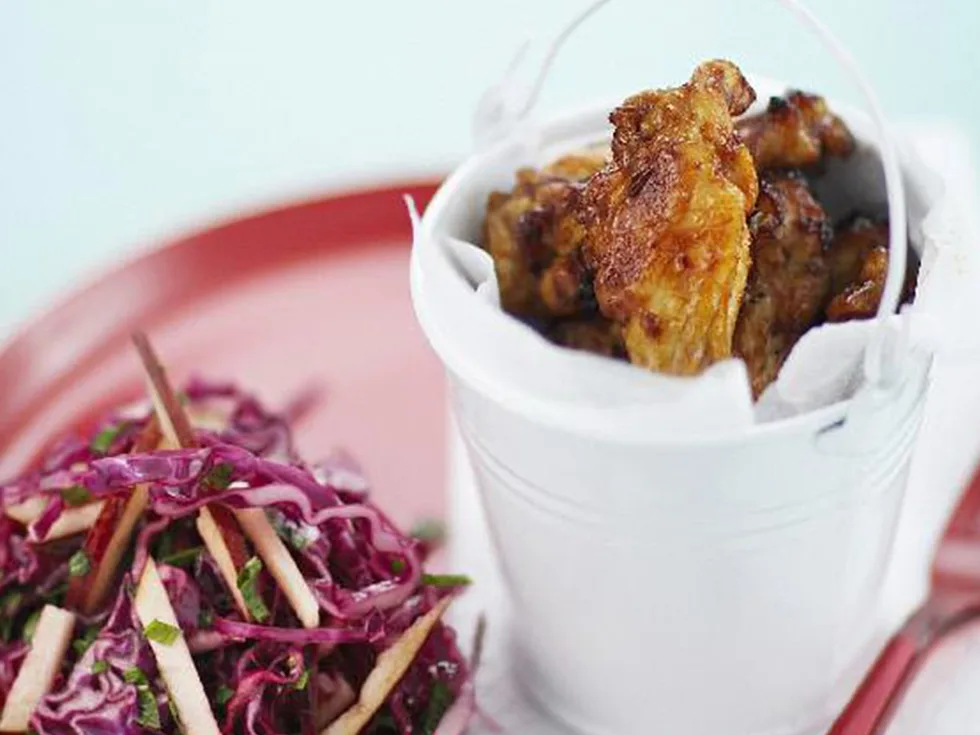 finger lickin' chicken wings with pink coleslaw