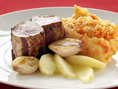 sliced pan-fried fillet with carrot and potato mash