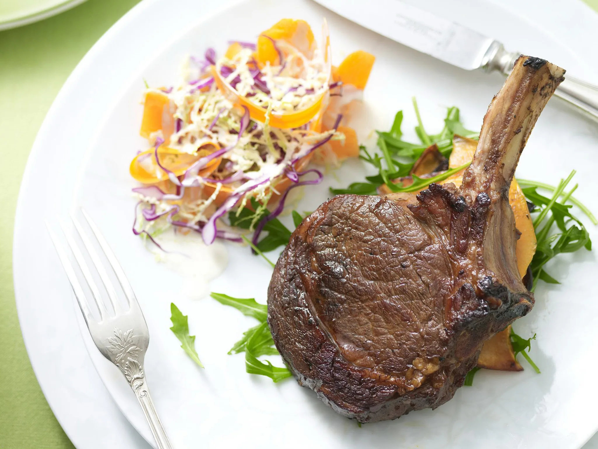 rib eye steaks with sweet potato and coleslaw