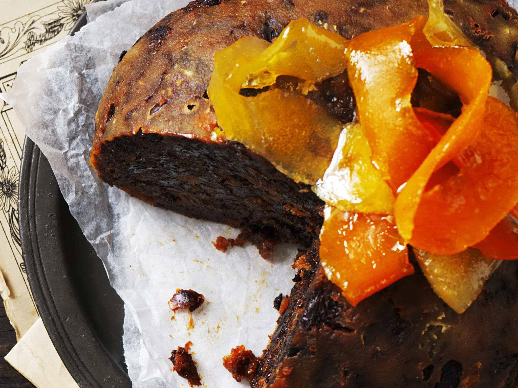 boiled Christmas pudding with homemade citrus peel