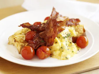 creamy scrambled eggs on brioche with crispy bacon