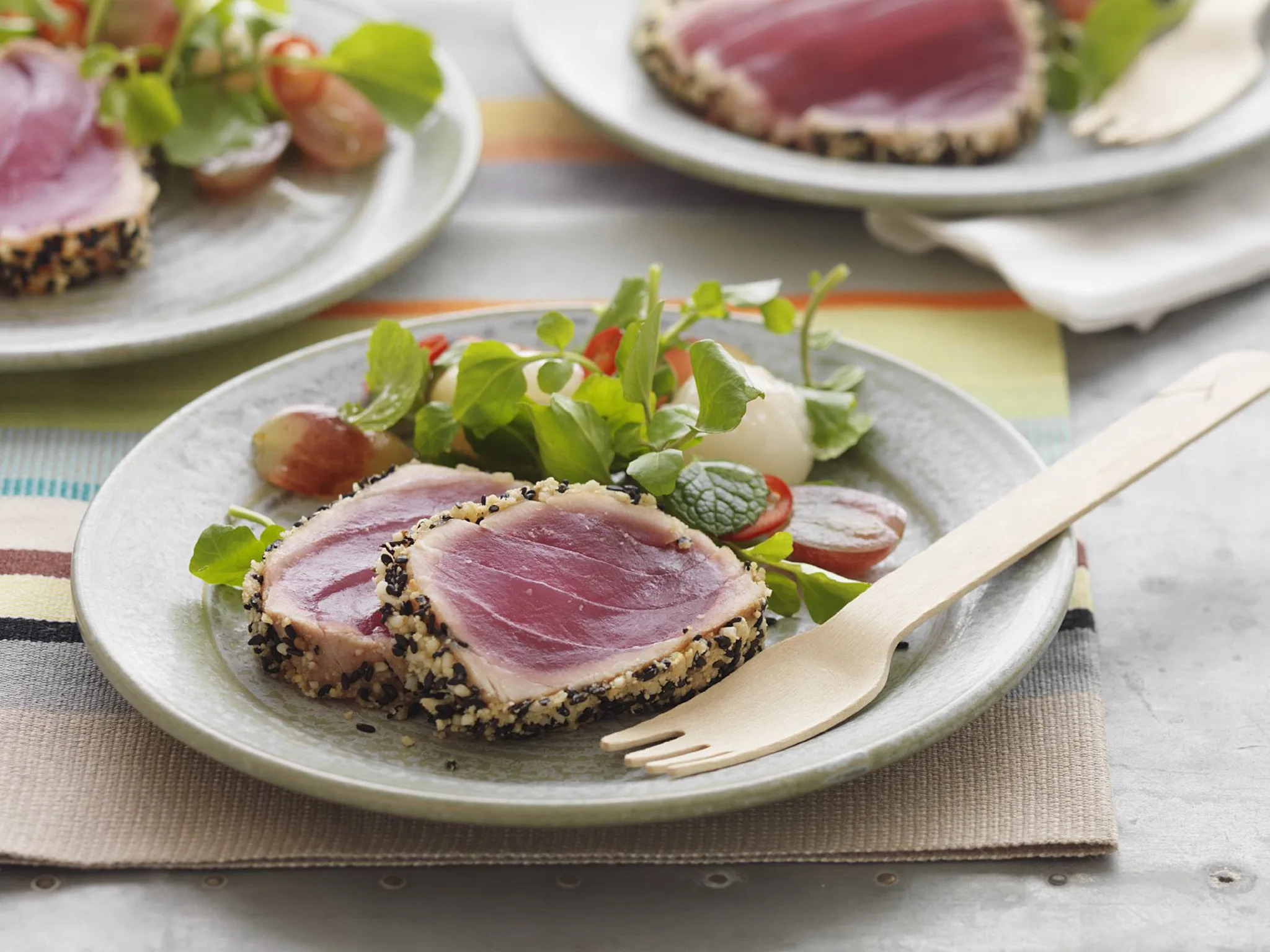 sesame crusted tuna with grape and lychee salad