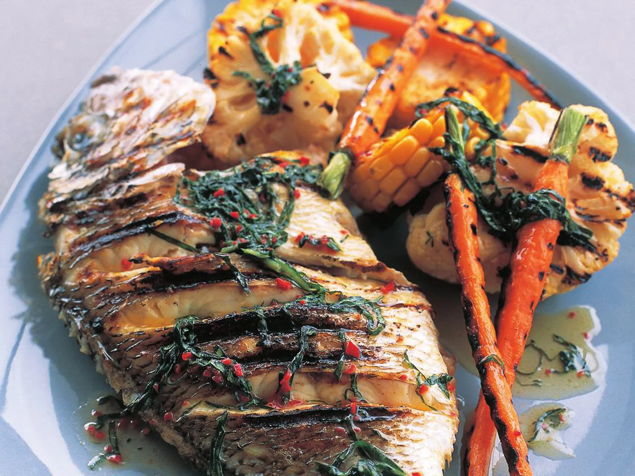 whole fish and vegetables with chilli basil sauce