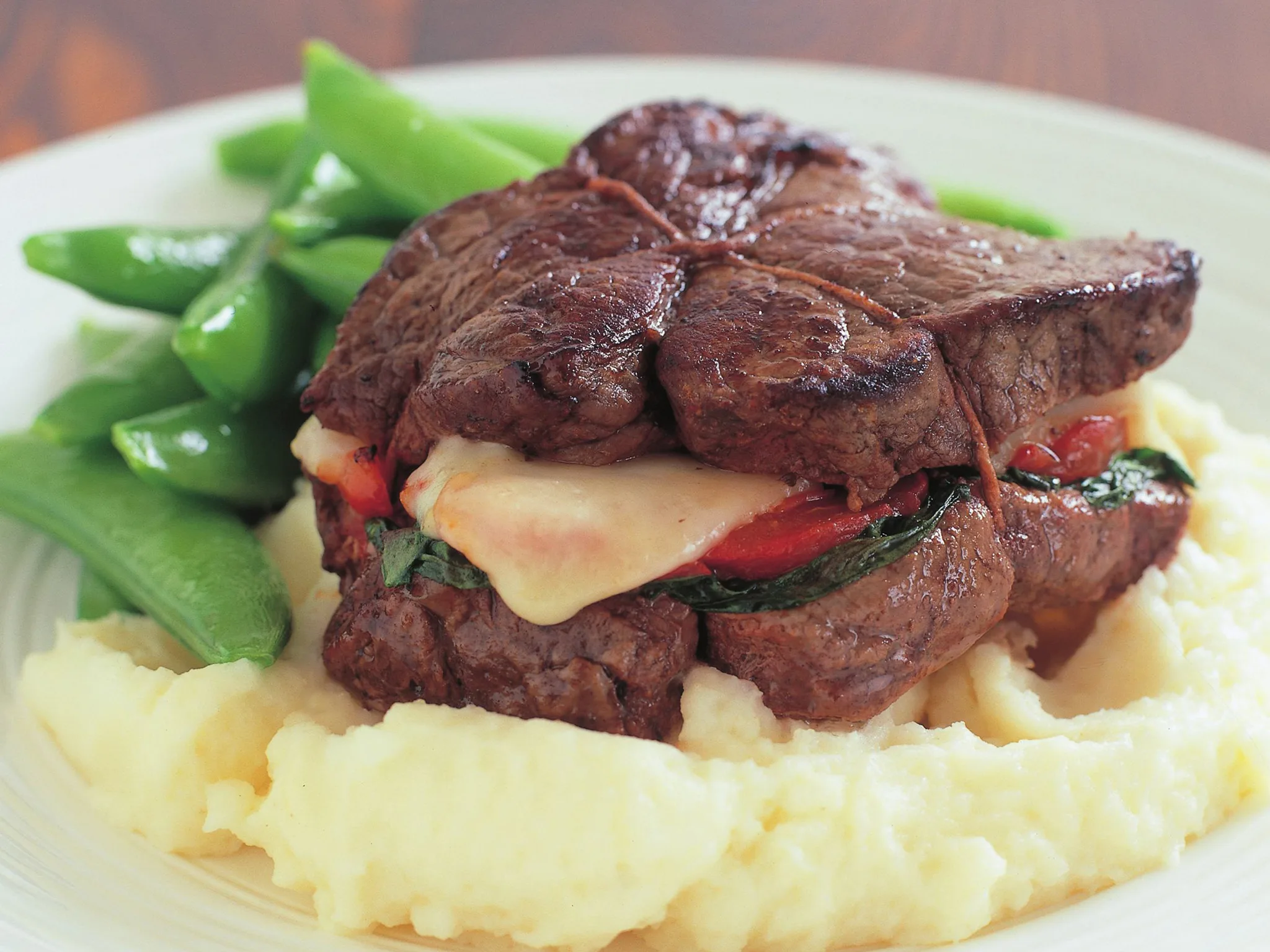 fillet steak, cheese and capsicum stacks with parmesan mash