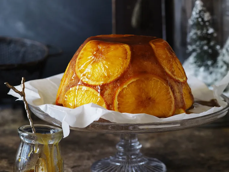 orange pudding with rum sauce