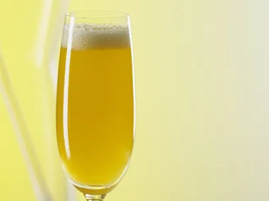 peach bellini in a champagne flute
