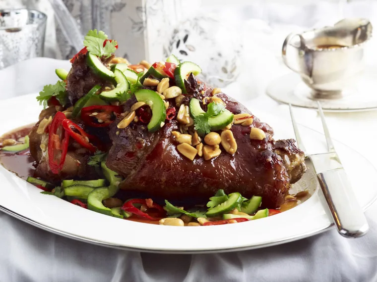 braised pork hock with peanut caramel and pickled cucumber