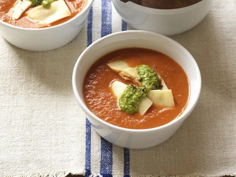 spicy tomato with ricotta ravioli and rocket pesto