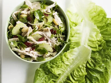 turkey, craisins and peanut salad in butter lettuce leaves