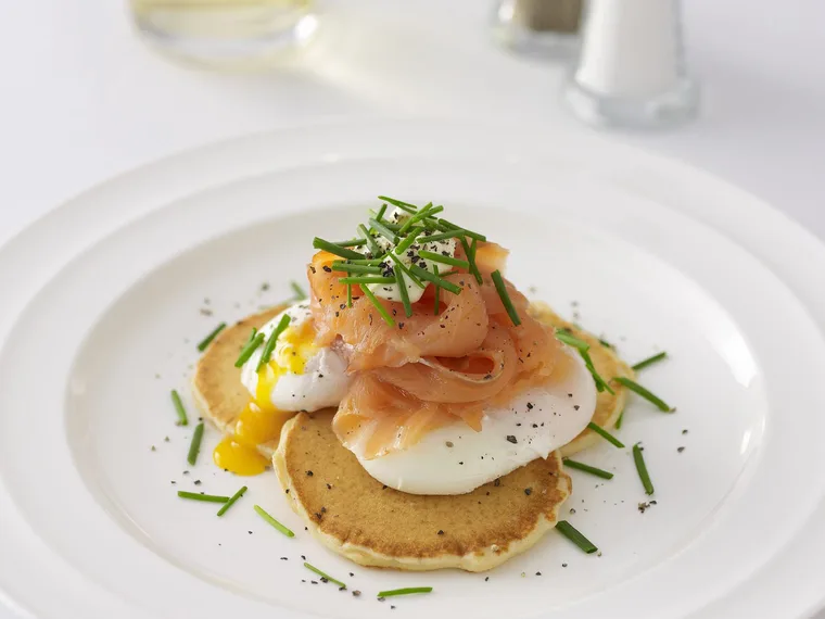 eggs and smoked salmon on blini