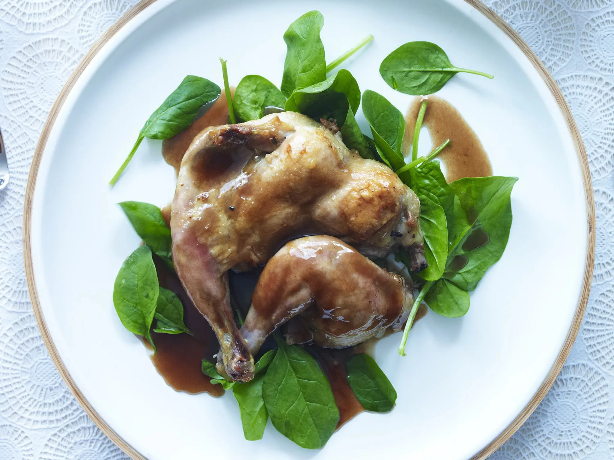 chicken confit with spinach and pan jus