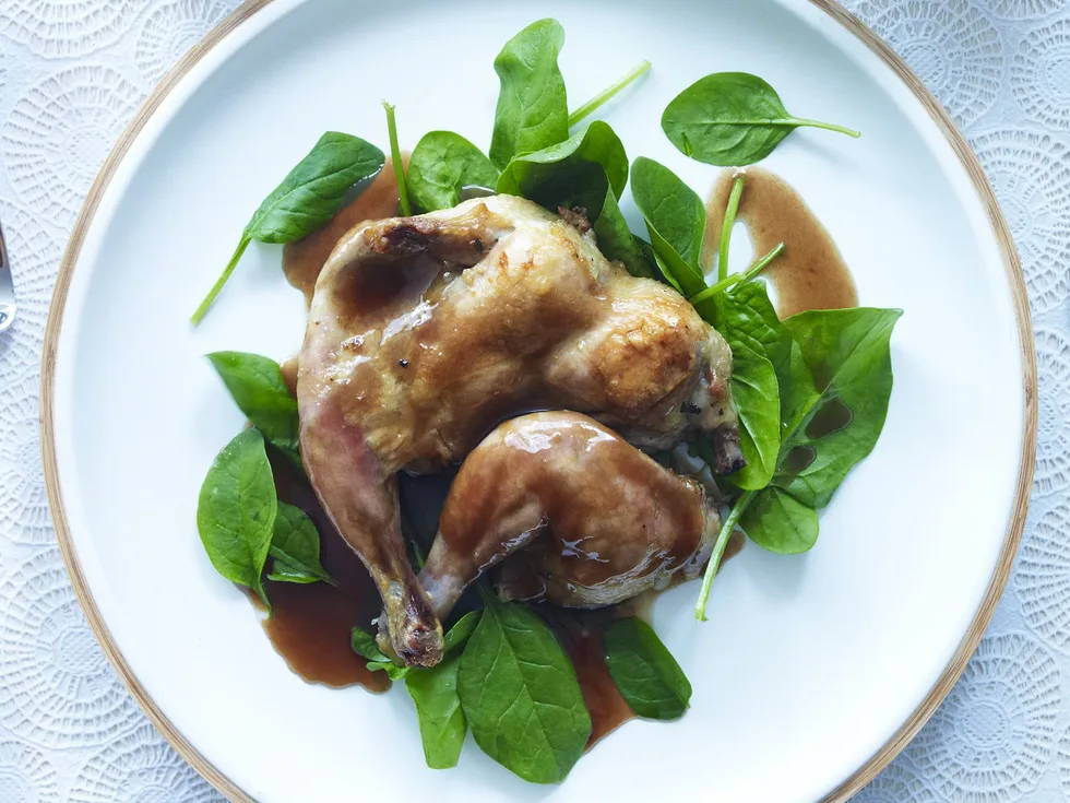 chicken confit with spinach and pan jus