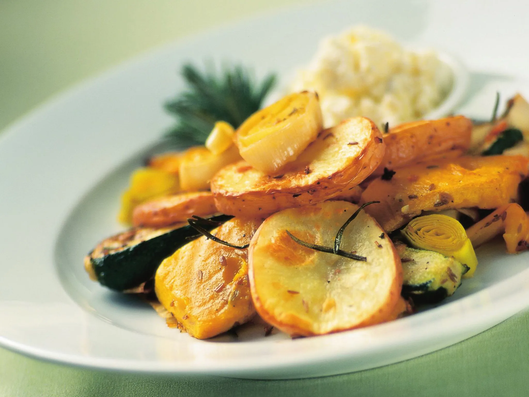 mixed baked vegetables with rosemary and garlic