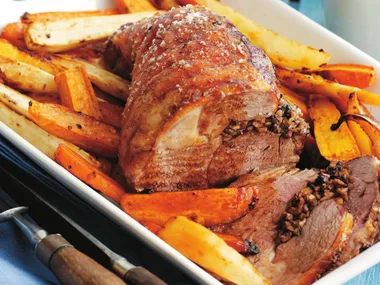 Duxelles-filled lamb leg with roast vegetables