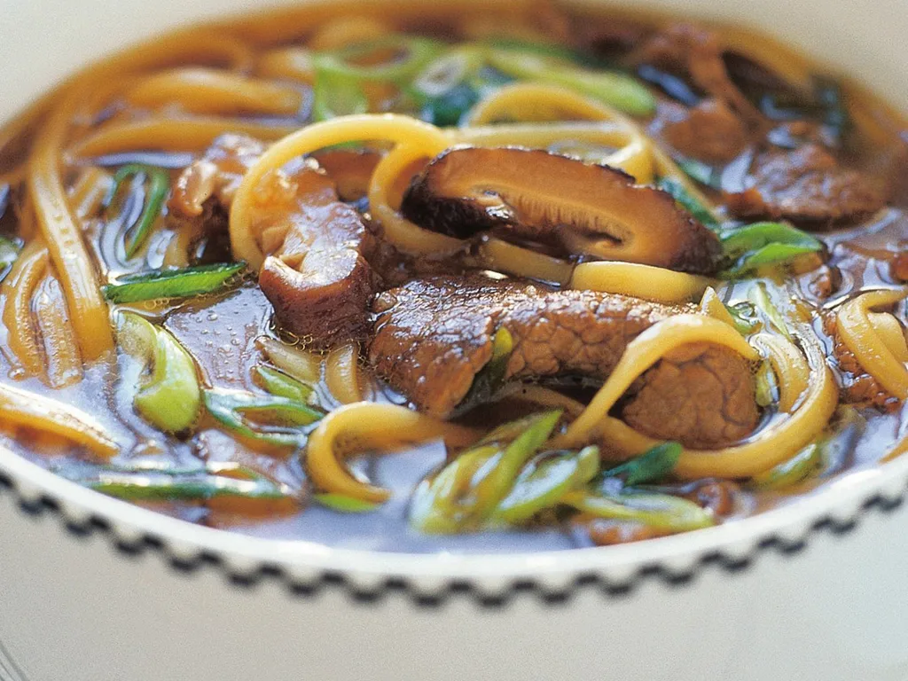 Beef with ramen and mushrooms