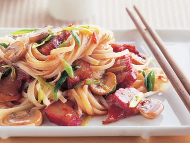 chinese barbecued pork and rice noodle stir-fry